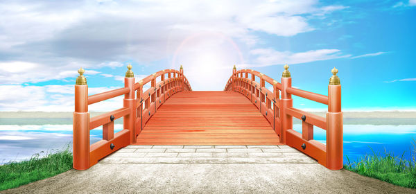 Pier amidst sea against sky