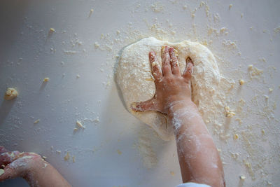 Close-up of person preparing food