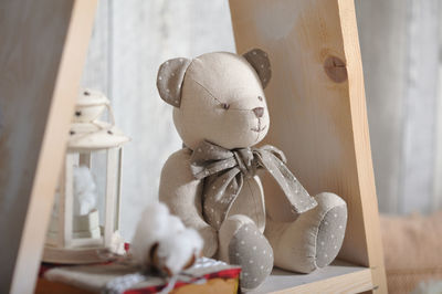 Close-up of stuffed toy on table at home