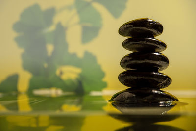 Close-up of stone stack on table