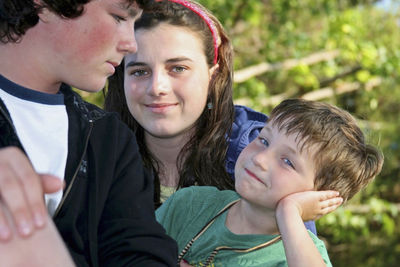 Children sitting outdoors