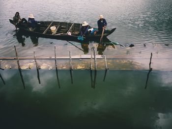 Boats in calm lake