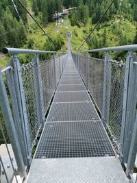 Footbridge amidst trees