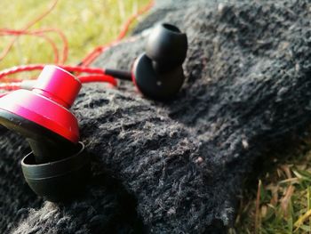 Close-up of ear phones on knit hat