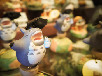 Close-up of figurine toy in market