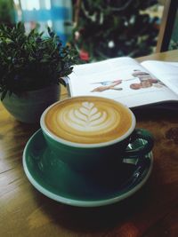 Coffee cup on table