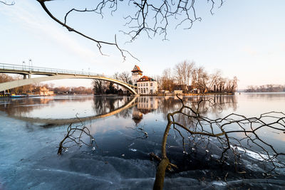 Bridge over frozen river during winter