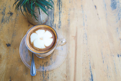 High angle view of coffee cup on table