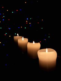 Close-up of illuminated candles