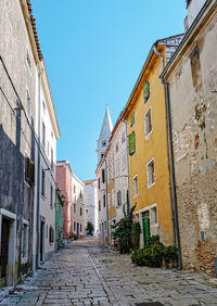 Picturesque old town, street, no people, colorful buildings.