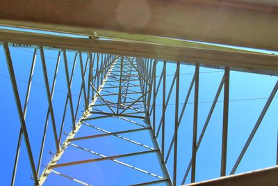 Low angle view of metallic structure against sky