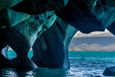 Scenic view of rock formation in sea