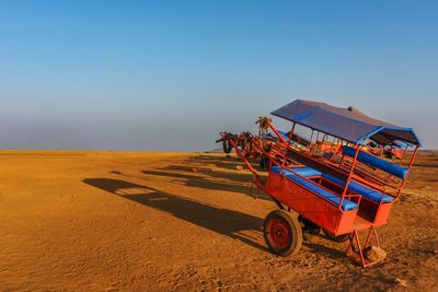 Empty horse carriages on a field in the table lands in the town of panchgani in maharashtra, india