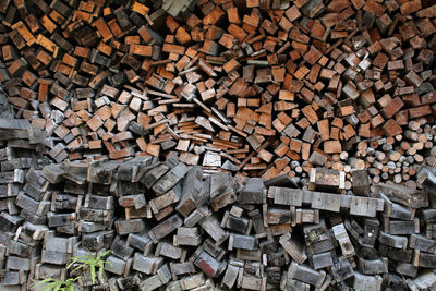 Full frame shot of logs in forest