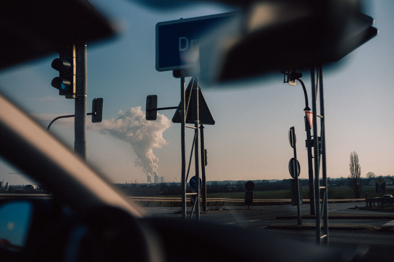 light, lighting, sky, no people, transportation, focus on background, vehicle, street light, selective focus, nature, indoors, black, mode of transportation