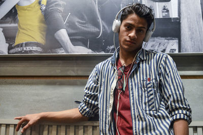 Portrait of young man sitting