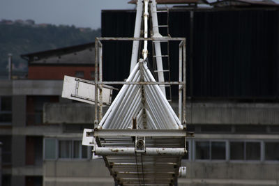 Close-up of rope tied up on metal