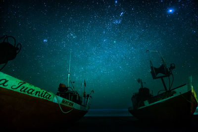 Ship against sky at night