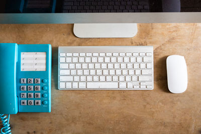 Directly above shot of computer keyboard on table