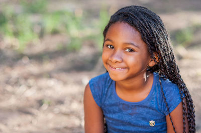 Portrait of smiling girl with long hair