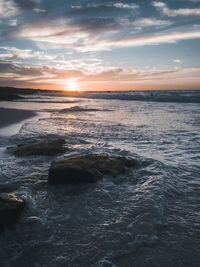 Scenic view of sea against sky during sunset