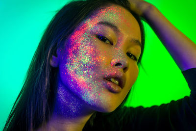 Close-up of young woman with face paint