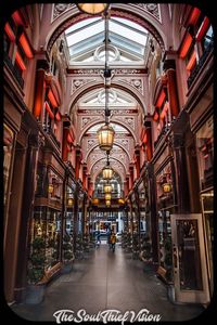 People walking in illuminated corridor