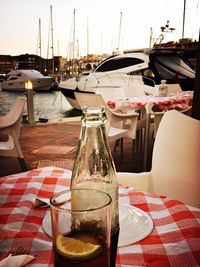 Boats moored at harbor