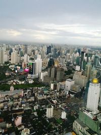 High angle view of buildings in city against sky