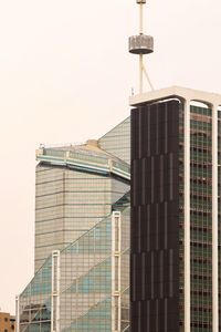 Low angle view of modern building against clear sky