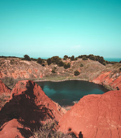 Scenic view of sea against clear blue sky