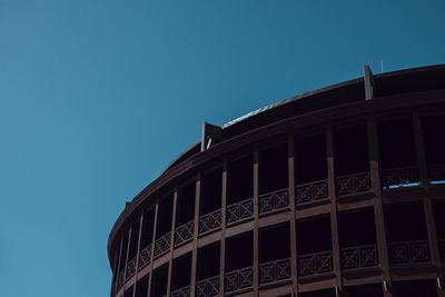 Low angle view of building against blue sky