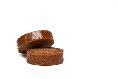 Close-up of chocolate cake against white background