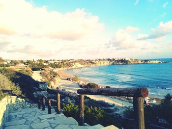 Scenic view of sea against cloudy sky