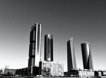 Low angle view of buildings against clear sky