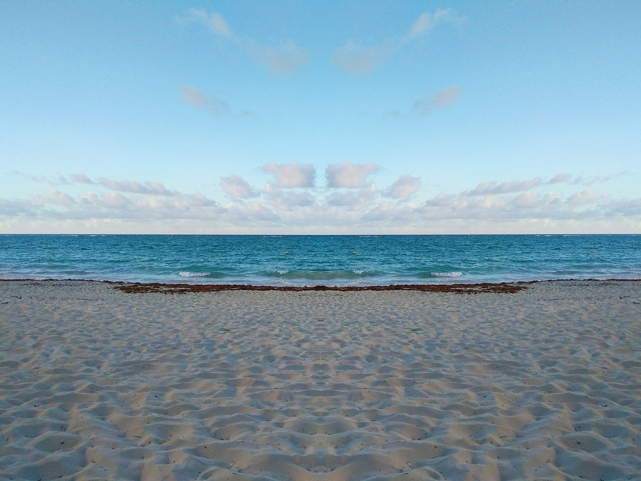 VIEW OF BEACH AGAINST SKY