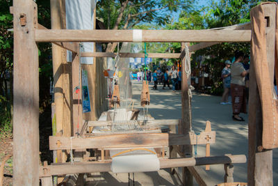 Chairs and table against trees in park