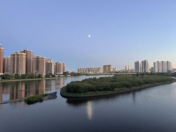 Bridge over river against sky