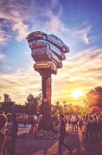 People against sky during sunset