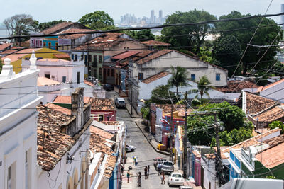 High angle view of houses and buildings in city