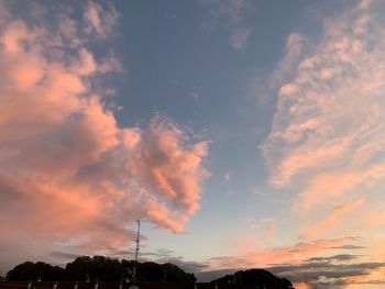 Low angle view of dramatic sky during sunset