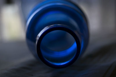 Close-up of blue glass bottle