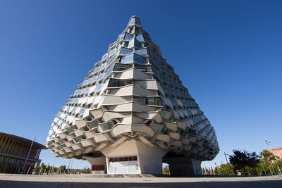 Low angle view of building against blue sky