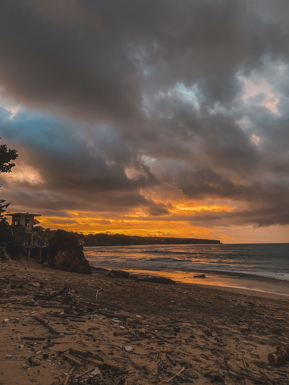 SCENIC VIEW OF BEACH DURING SUNSET