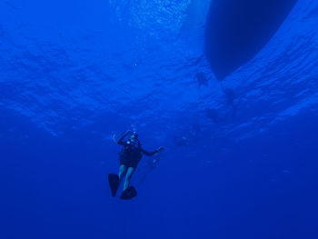 Man scuba diving in sea