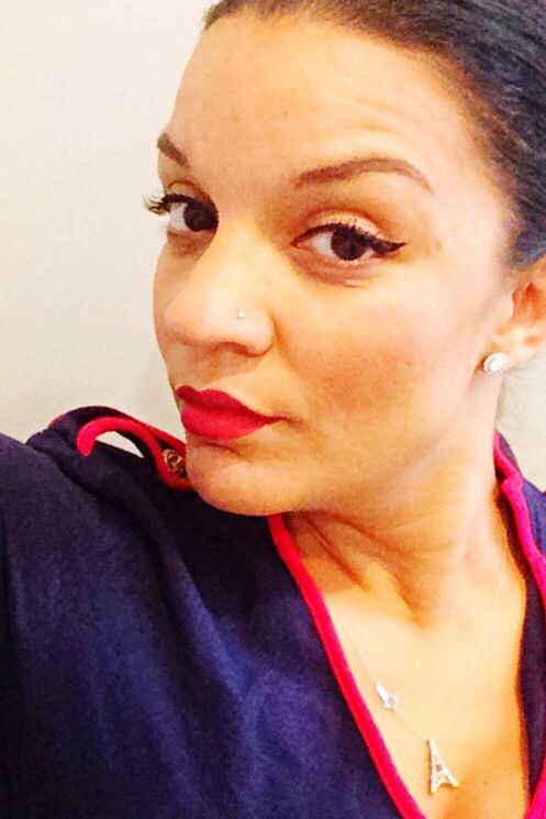 real people, looking at camera, headshot, one person, red, lifestyles, portrait, close-up, front view, young women, young adult, indoors, day, people