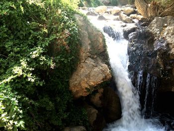 Stream flowing through rocks