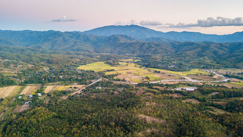 Aerial view of landscape and mountains against sky