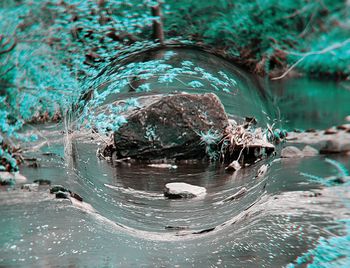 High angle view of water splashing in lake