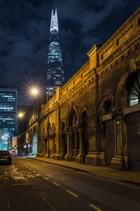 Illuminated buildings in city at night